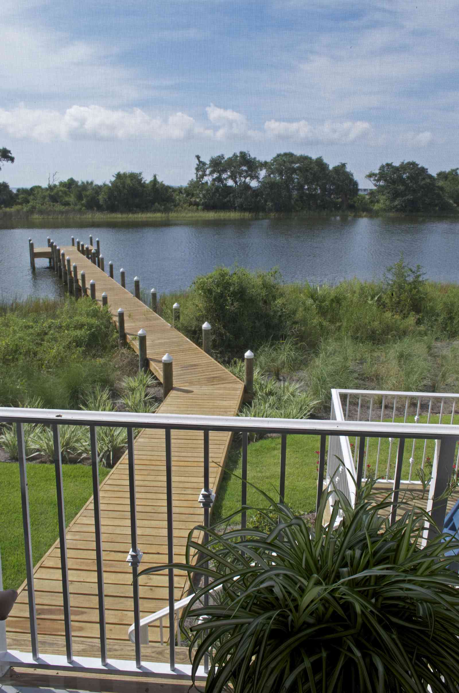 400+LaRua+Landing-3rd+floor+porch+facing+Bayou+Texar_01.jpg:  metal railing, porch island, Bayou Texar, dock, pier, , 