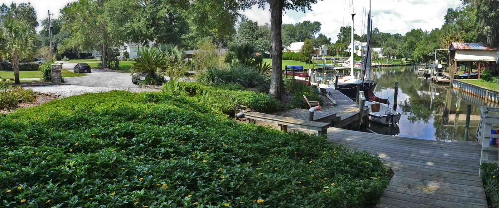 409+Montrose+Blvd-front+yard_03.jpg:  sail boat, deck, patio, flagstone, 