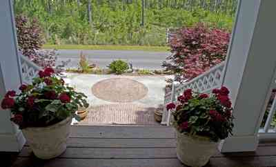 5850+Innerarity+Point+Rd-front+porch_02.jpg:  