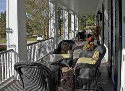 7660+Dairy+Rd-front+porch_02.jpg:  