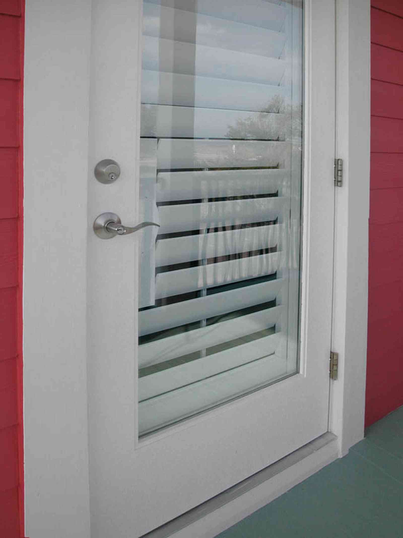 Aragon:-649-Aragon-Street_31.jpg:  back door, balcony, venitan blinds, porch