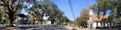 Bagdad:-Methodist-Church_01.jpg:  victorian church building, spanish moss, live oak tree, white picket fence, bagdad florida