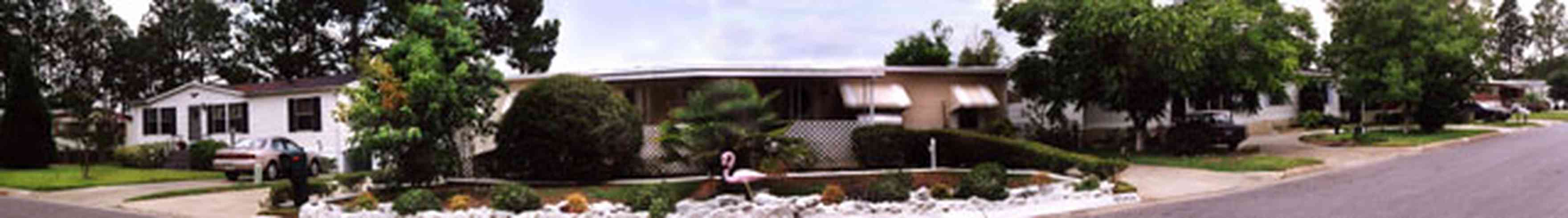 Bayou-Grande:-Bayou-Grande-Villas-Mobile-Home-Park_01.jpg:  flamingo, mobile home, trailor, awnings, bayou grande