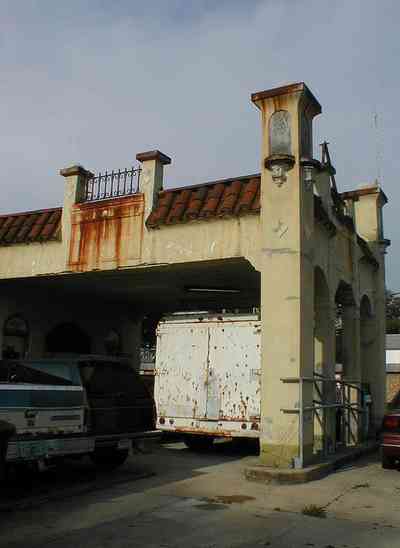 Belmont-Devillers:-Gas-Station_01.jpg:  gasoline, spanish revival architecture, service station, arch, red tile roof