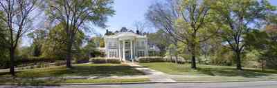 Brewton:-Belleville-Avenue_06.jpg:  victorian mansion, front porch, greek revival facade, classical revival, columns, azalea bushes, turret, colonnade