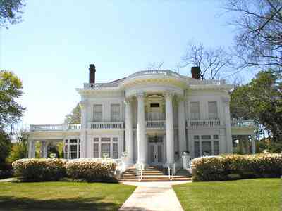 Brewton:-Belleville-Avenue_07.jpg:  victorian mansion, front porch, greek revival facade, classical revival, columns, azalea bushes, turret, colonnade