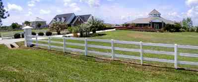 Cantonment:-Milestone_25.jpg:  cumulus clouds, oak trees, boulevard, tract houses, white board fence,  garden