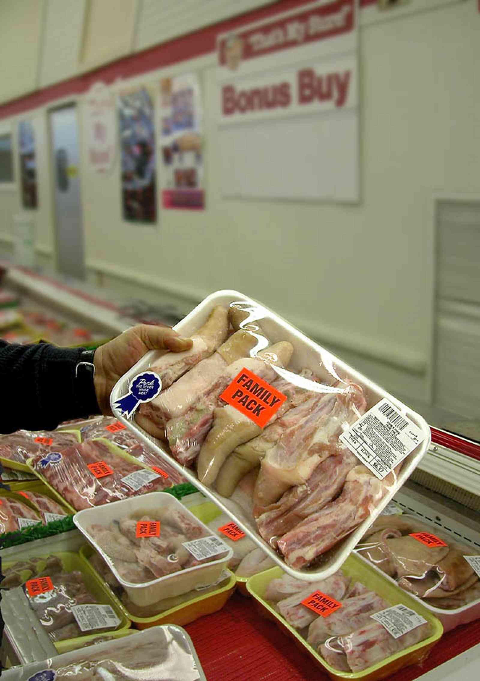 Century:-Piggly-Wiggly-Supermarket_06.jpg:  pig tails, pig ears, freezer case, meat department, meat products
