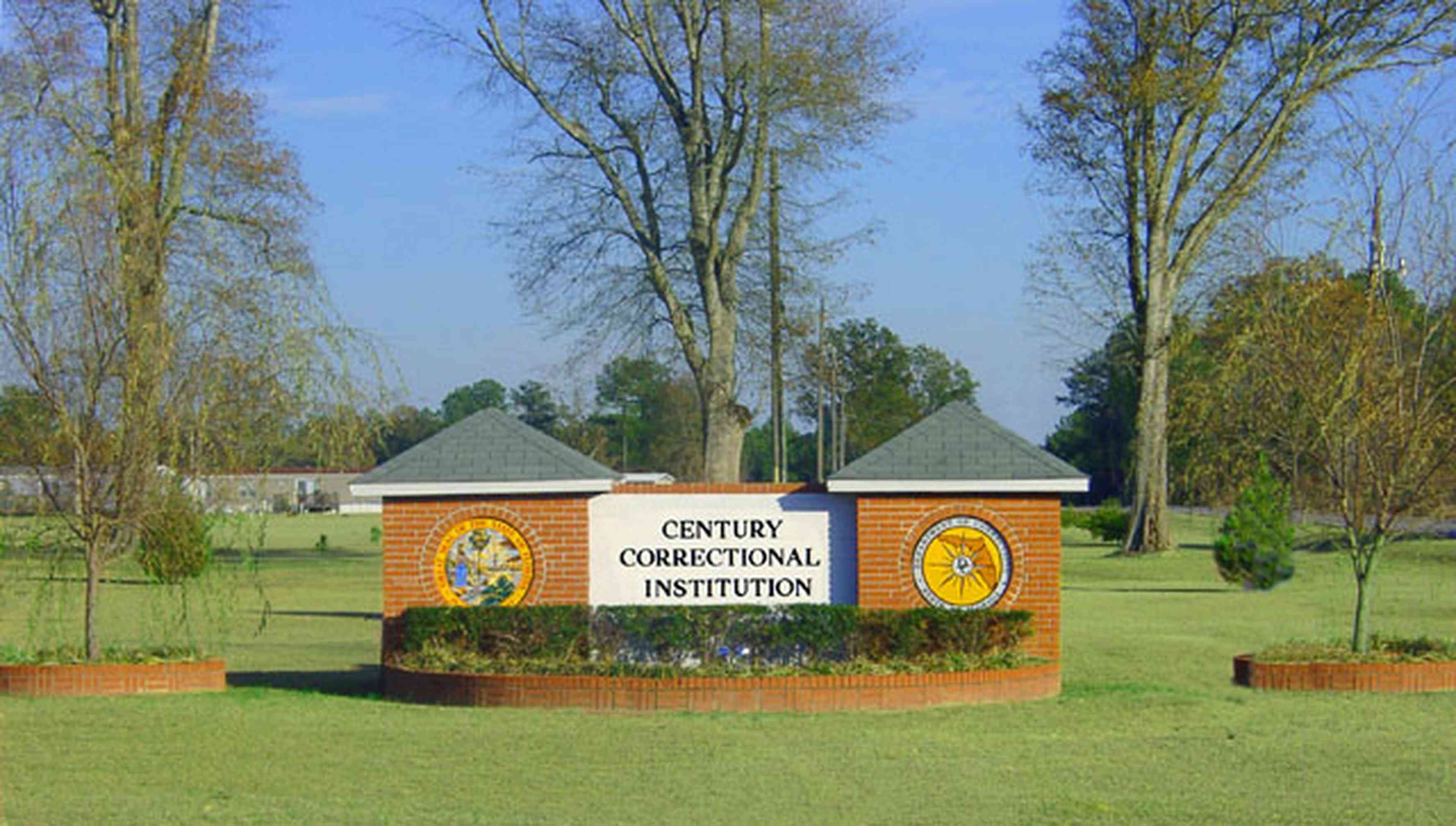 Century:-Prison_00.jpg:  oak trees, brick sign, prison entrance