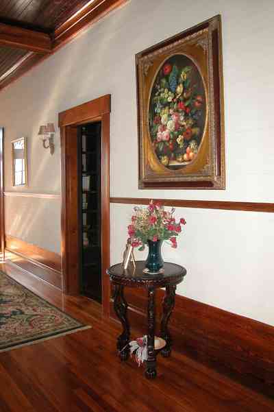 Century:-Tannenheim_01e.jpg:  heart pine floor, wood ceiling, oriental rug, wainscotting