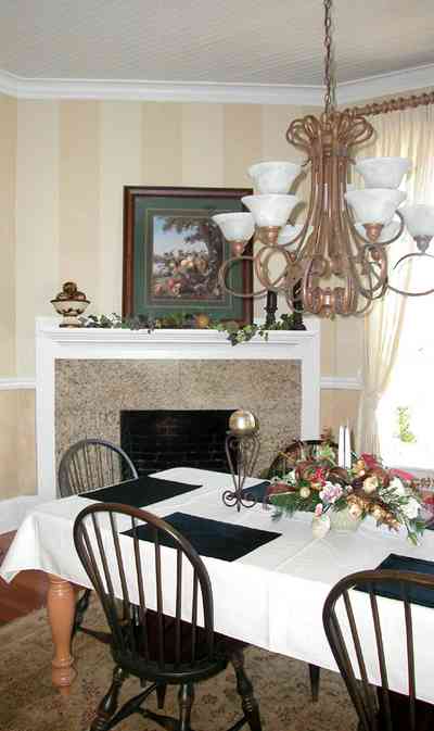Century:-Tannenheim_01f.jpg:  oriental rug, dining room, fireplace, mantelpiece