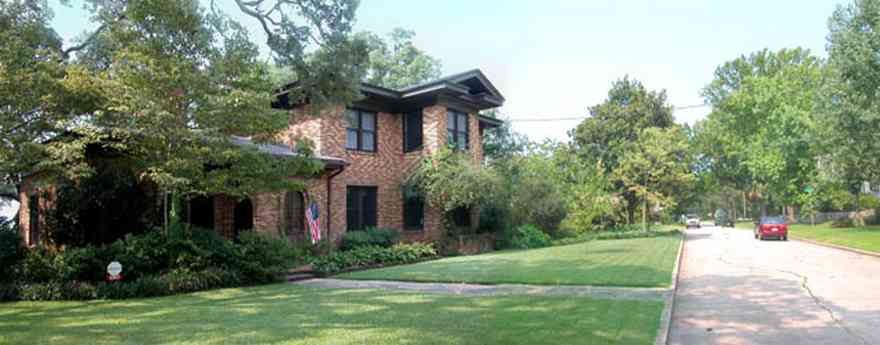 East-Hill:-1801-East-La-Rua-Street_01.jpg:  waterfront property, brick house, oak trees, old city tract