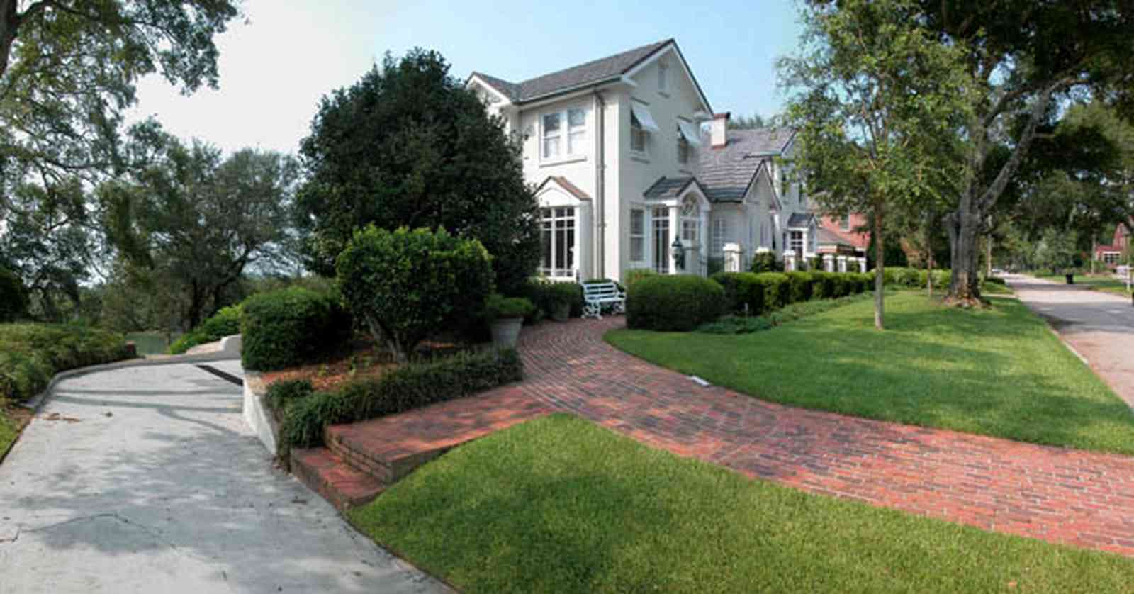 East-Hill:-1823-East-La-Rua-Street_03.jpg:  terrace, driveway, brick sidewalk, dormer window, awning, pensacola bay, , 