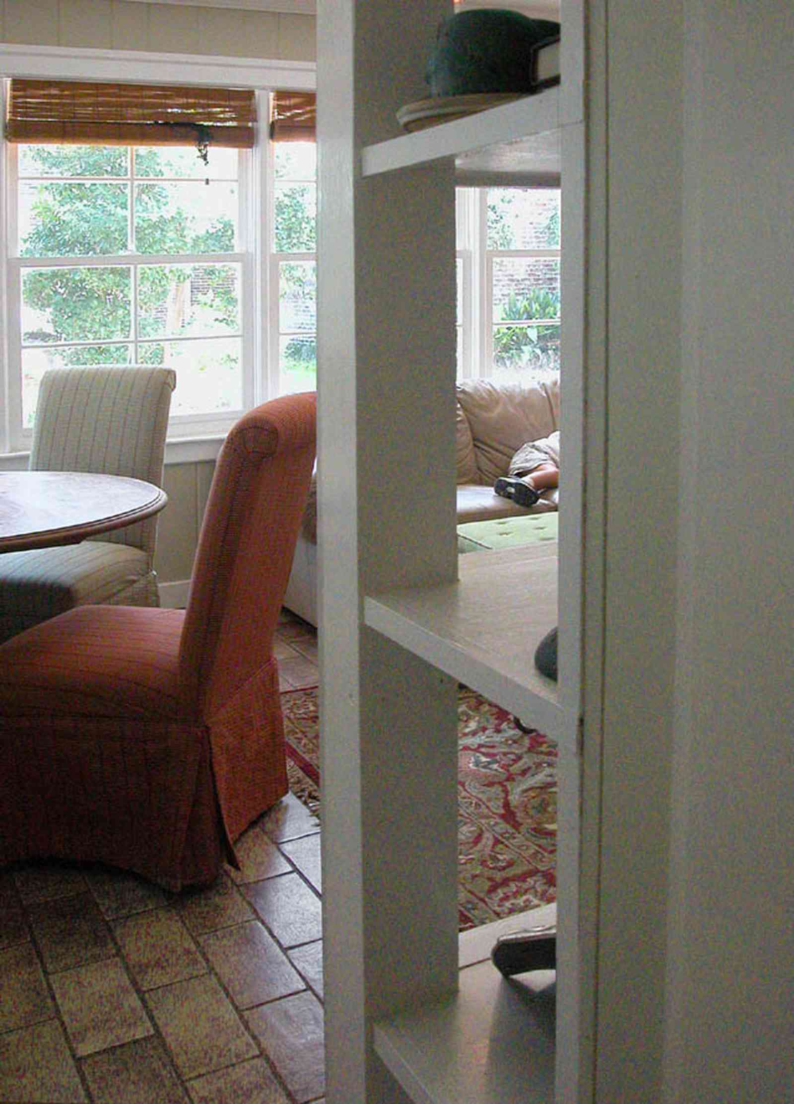 East-Hill:-2109-Whaley-Drive_22.jpg:  cupboard, corner shelves, display shelves, dining area, ceramic brick floor