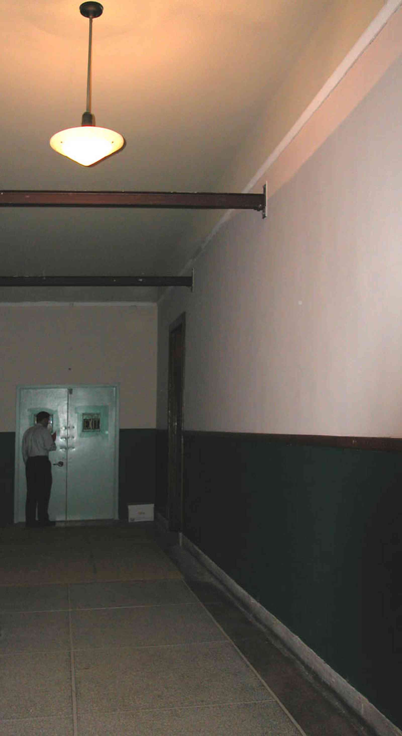 East-Hill:-Tower-East:-Old-Sacred-Heart-Hospital_39.jpg:  gothic revival architecture, granite floors, swinging door, operating room