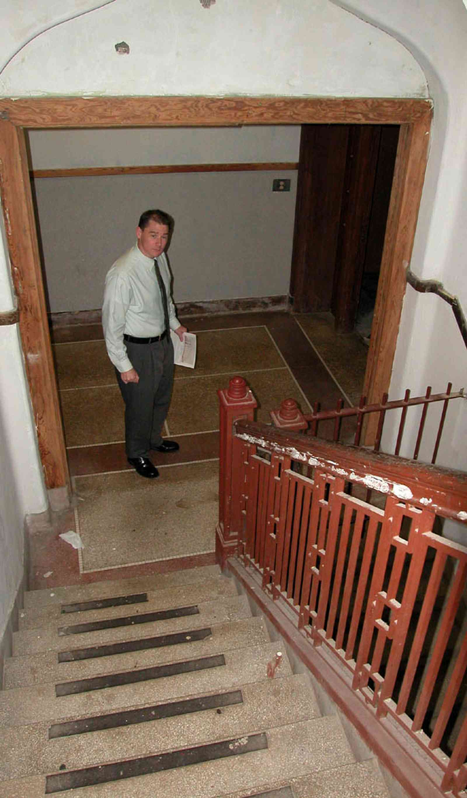 East-Hill:-Tower-East:-Old-Sacred-Heart-Hospital_42.jpg:  metal balustrade, iron gate, granite floor, cellar