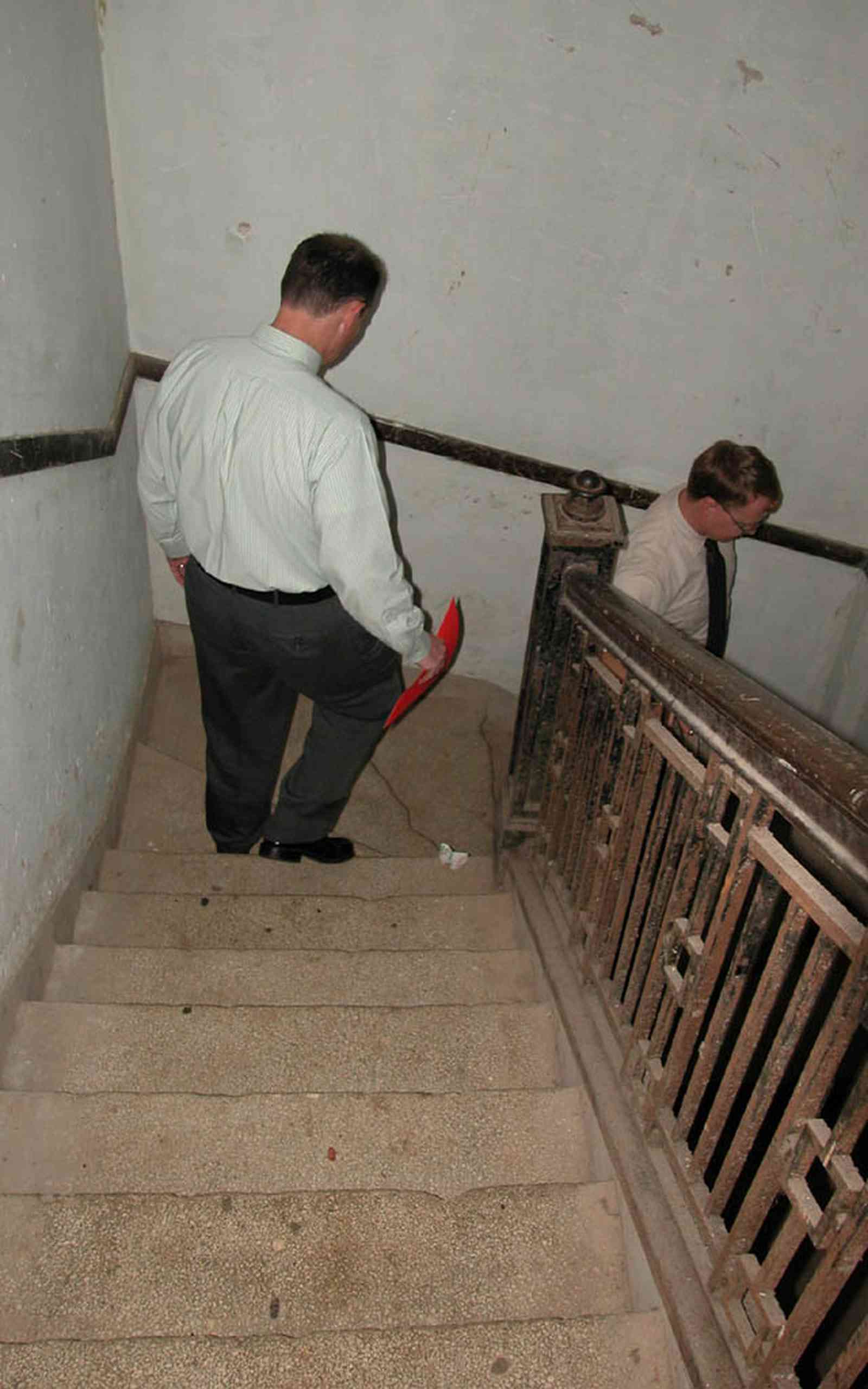 East-Hill:-Tower-East:-Old-Sacred-Heart-Hospital_42a.jpg:  staircase, metal railings, molding, granite stairs