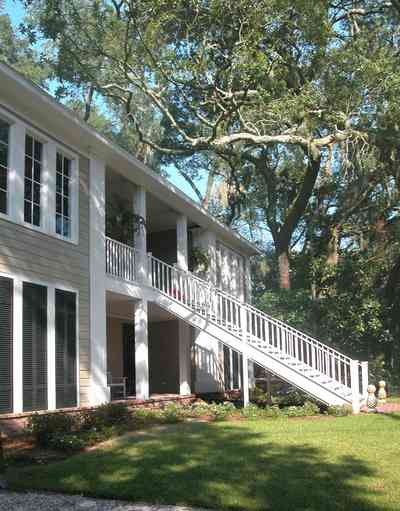 East-Pensacola-Heights:-112-Chipley-Avenue_02.jpg:  oak tree, raised cottage, pyramidal roof, brick sidewalk