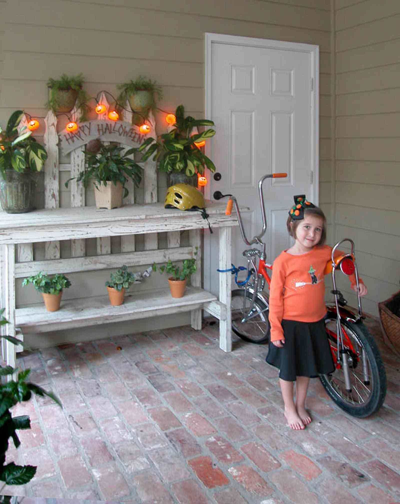 East-Pensacola-Heights:-112-Chipley-Avenue_19.jpg:  living area, patio, veranda, libby adams, chest, brick floor