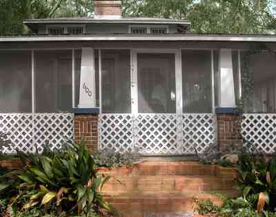 East-Pensacola-Heights:-600-Bayou-Blvd_03.jpg:  latticework, brick pillars, brick sidewalk, brick steps, screened porch, bayou house, front door, craftsman cottage, bungalow, house