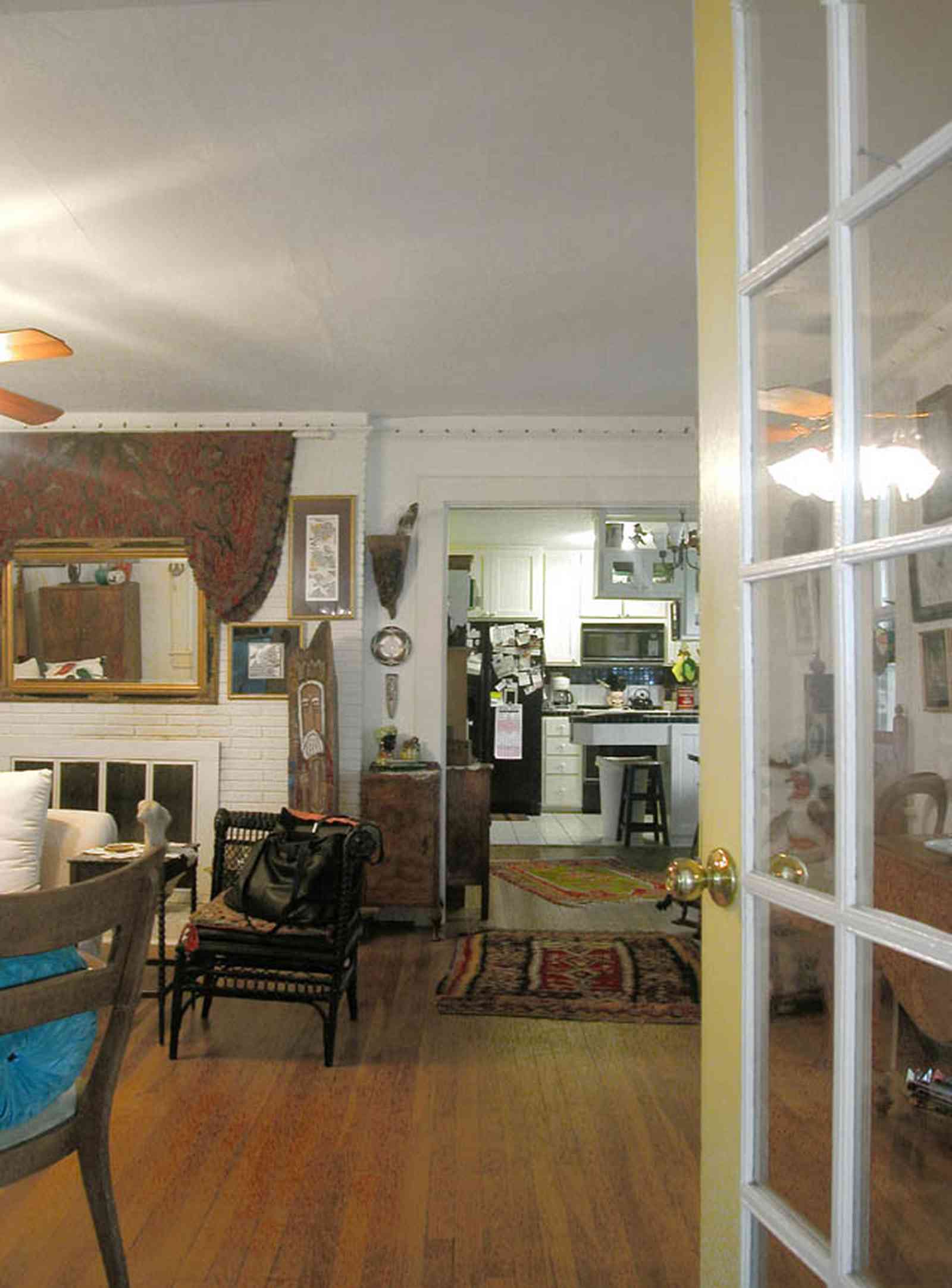 East-Pensacola-Heights:-600-Bayou-Blvd_07.jpg:  heart pine floor, fireplace, great room, french door, open floor plan, cottage, craftsman style