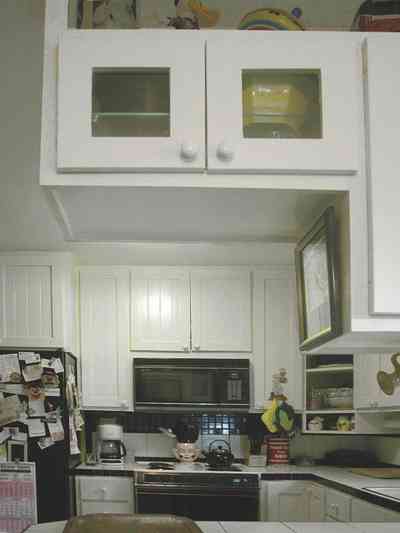 East-Pensacola-Heights:-600-Bayou-Blvd_13.jpg East-Pensacola-Heights:-600-Bayou-Blvd_13.jpg: kitchen, ceramic tile counters, display cabinets, built-in appliances,