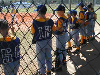 Ensley:-JR-Jones-Ballfield_09a.jpg:  photographer, dugout, ball players, mike, little league players