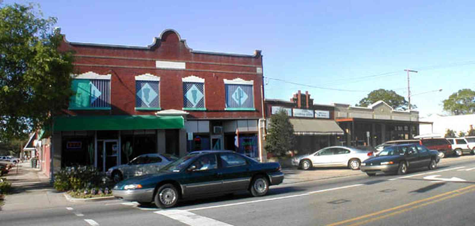 Foley:-Downtown_03.jpg:  storefront, model t-ford, drugstore, pharmacy, downtown, small town america, alabama, soda shop, flower garden