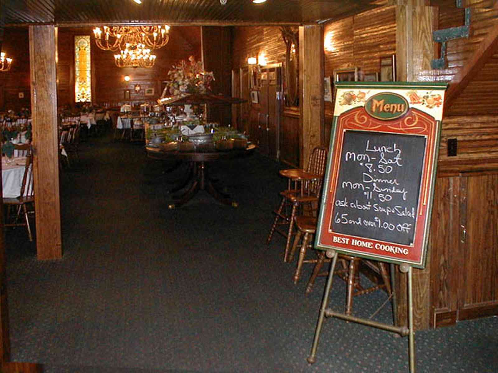 Foley:-The-Gift-Horse-Restaurant_01.jpg:  brass chandelier, beaded pine walls, buffet table, banquet table, silver compote, restaurant