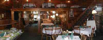 Foley:-The-Gift-Horse-Restaurant_03.jpg:  brass chandelier, beaded pine walls, buffet table, banquet table, silver compote, restaurant