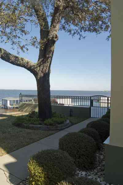 gulf+breeze-peake_27_s+point-couch+dreams-back+patio-gate.jpg:  