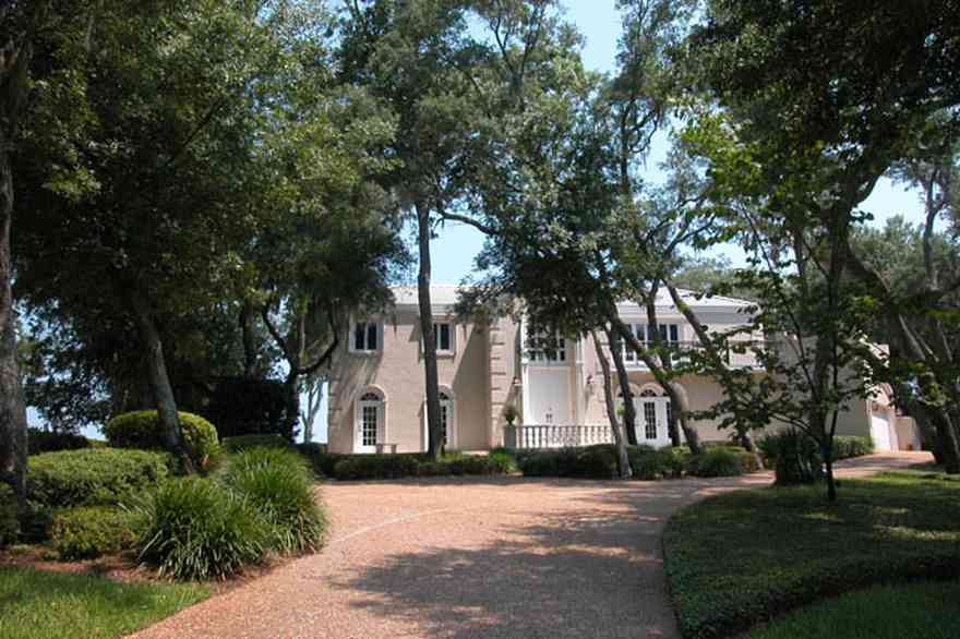 Gulf-Breeze:-508-Kenilworth-Drive_05-copy.jpg:  italienate architecture, circular driveway, oak trees, stucco facade