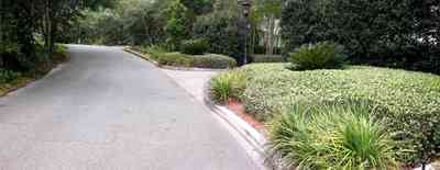 Gulf-Breeze:-72-Highpointe-Drive_00.jpg:  gas lantern, birch trees, circular driveway, fountain, tiled driveway