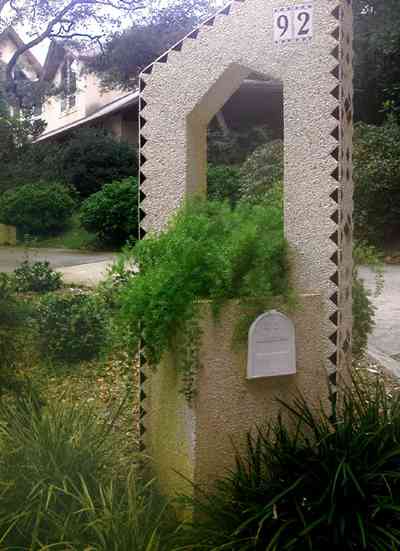Gulf-Breeze:-92-High-Point-Drive_01.jpg:  arch, fern, landscaping, 