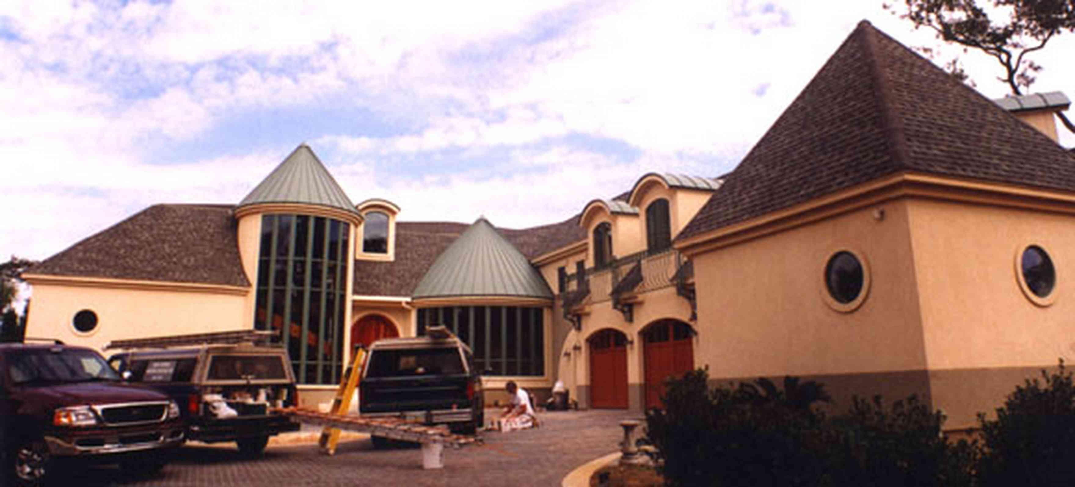 Gulf-Breeze:-Couch-Dreams_3.jpg:  castle, mansard roof, turret, circular driveway