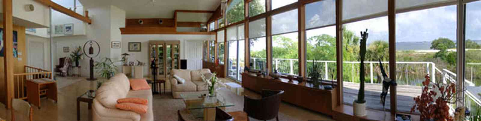 Gulf-Breeze:-Navy-Cove-House_02.jpg:  gulf coast, gulf breeze, gulf of mexico, dead mans island, modern house, porch, deck, couch, great room