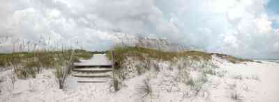 Gulf-Islands-National-Seashore:-Dunes-Nature-Trail_06.jpg:  bench, boardwalk, sea oats, barrier island, surf, waves, storm, cumulus clouds, barrier island