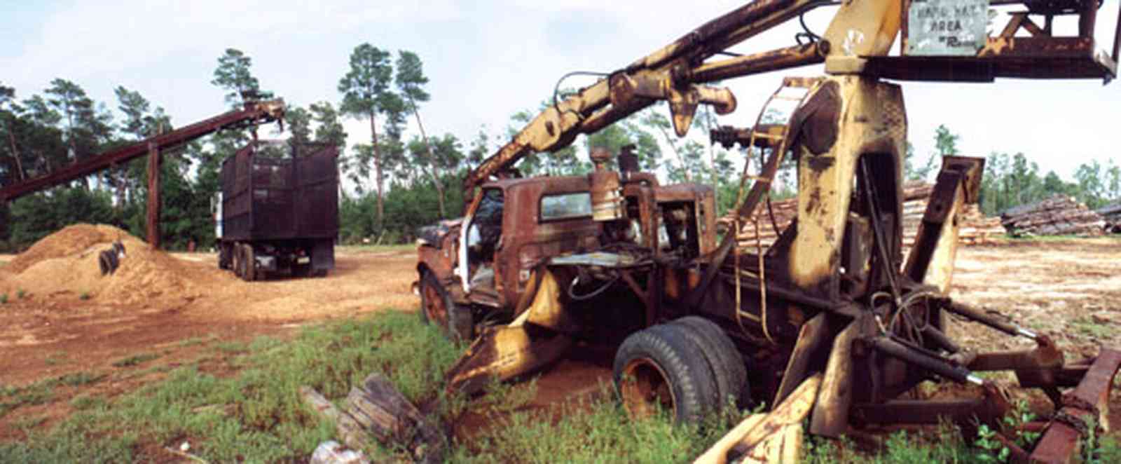 Harold:-Wilson-Lumber-Mill_2.jpg:  lumber mill, old truck, wreck, lumber, sawmill