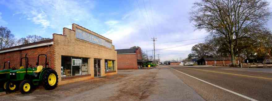 Jay:-Downtown_02.jpg:  tractor, sales office, brick storefront buildings