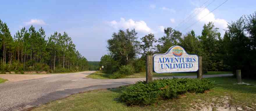 Milton:-Adventures-Unlimited_01.jpg Milton:-Adventures-Unlimited_01.jpg: sign, road, hwy 87, pine tree, santa rosa county