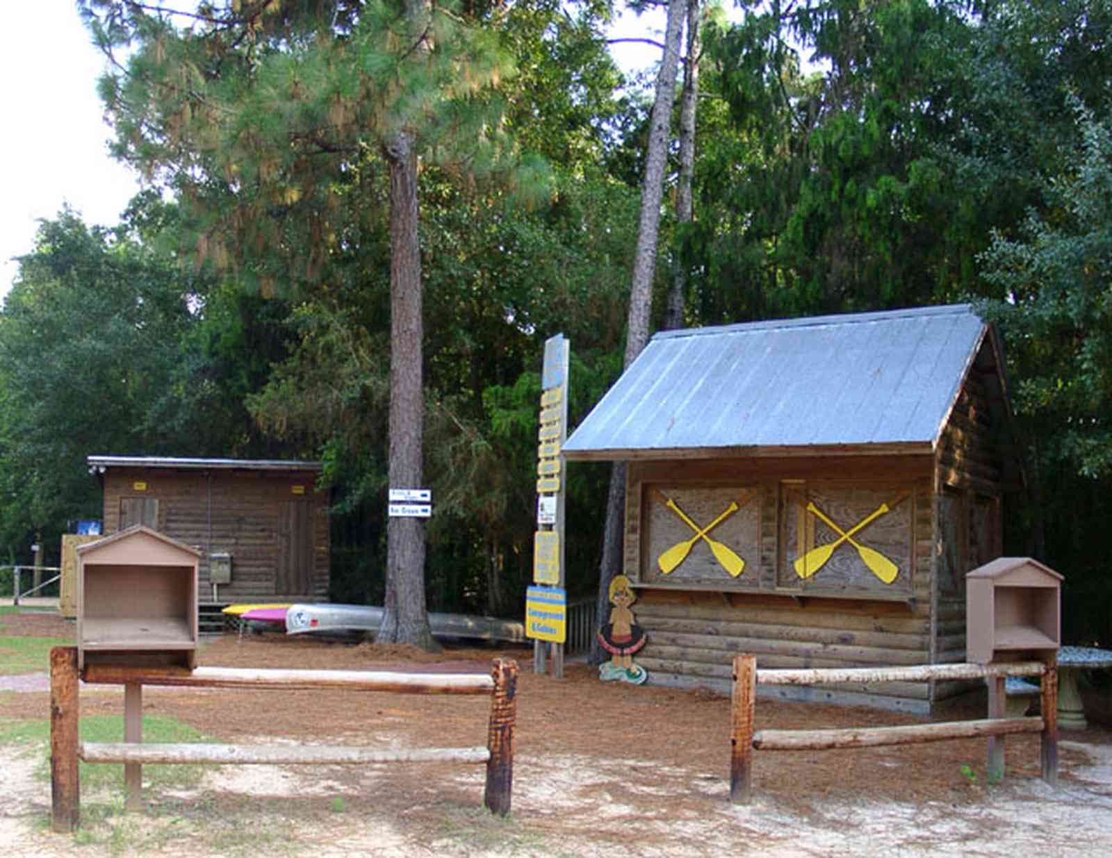 Milton:-Adventures-Unlimited_03.jpg:  fence, log, general store, camping, canoe, kayak, raft, park