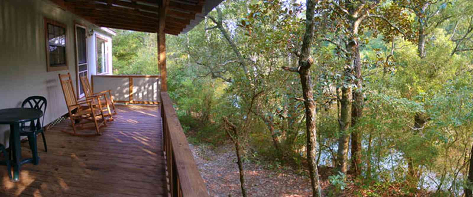 Milton:-Adventures-Unlimited_15.jpg:  rocking chair, wolfe creek, swamp, cabin, camping