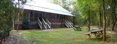 Milton:-Adventures-Unlimited_22.jpg:  cabin, house, home, accomodations, hotel, picnic bench