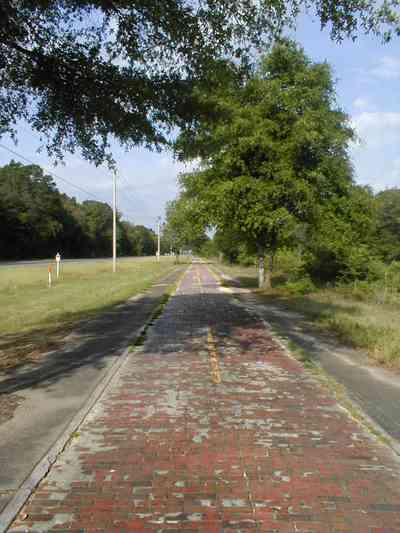 Milton:-Red-Brick-Road_13.jpg Milton:-Red-Brick-Road_13.jpg: brick road, historic marker, highway, two-lane road, red brick