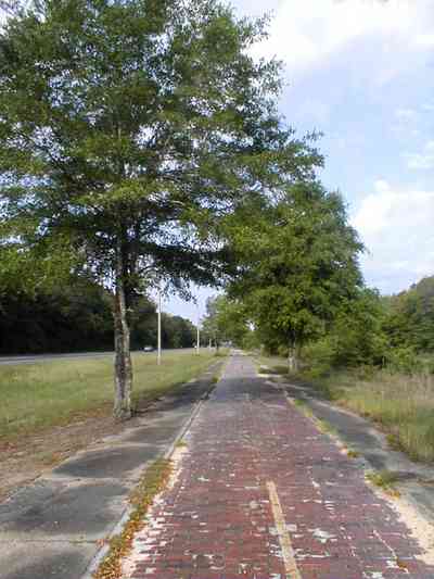 Milton:-Red-Brick-Road_14.jpg Milton:-Red-Brick-Road_14.jpg: brick road, historic marker, highway, two-lane road, red brick