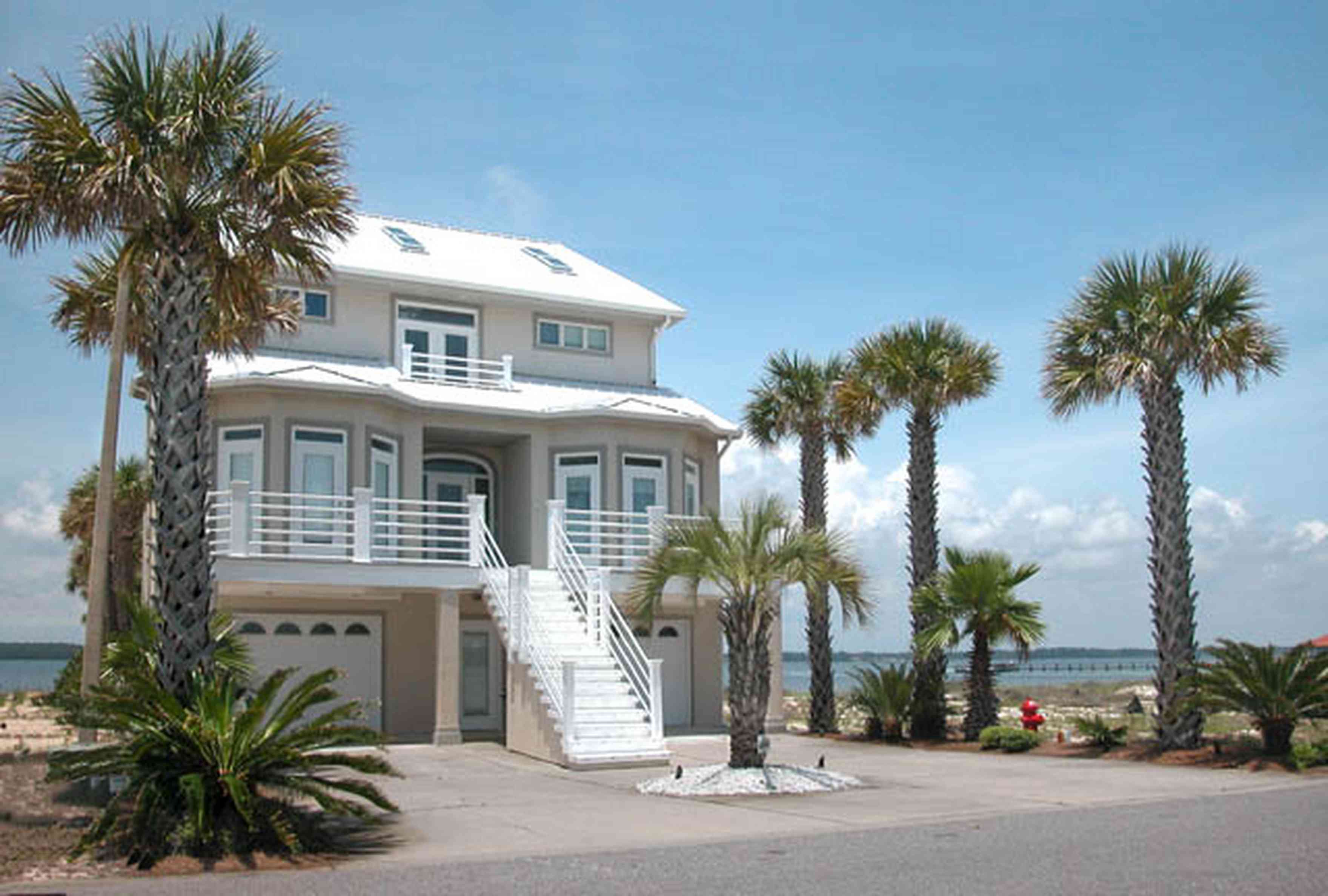 Navarre:-7332-Grand-Navarre-Blvd_01.jpg:  bayshore home, pensacola bay, balcony, driveway, skylights, beachfront home