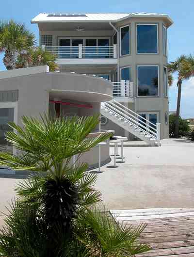 Navarre:-7332-Grand-Navarre-Blvd_08.jpg:  sego palm tree, cabana bar, beach house, deck