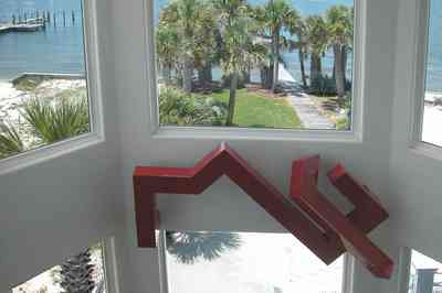 Navarre:-7332-Grand-Navarre-Blvd_10.jpg:  art deco house, view of bay, santa rosa sound, pier, dock, deck, window, sculpture