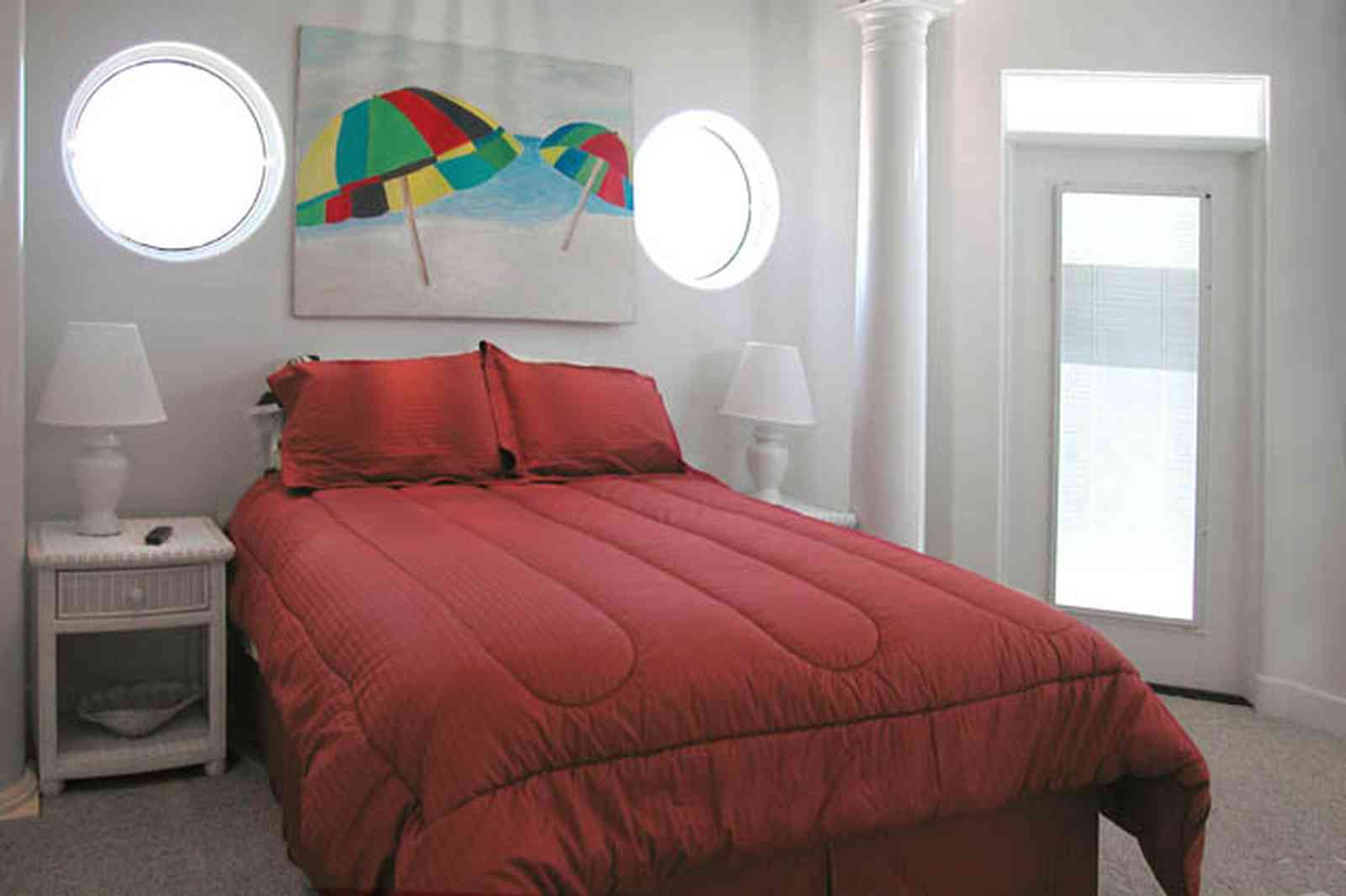 Navarre:-7332-Grand-Navarre-Blvd_36.jpg:  bedroom, art deco house, round windows, bedroom