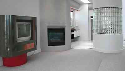 Navarre:-7332-Grand-Navarre-Blvd_53.jpg:  bedroom, art deco house, glass brick column, entertainment center, gas fireplace